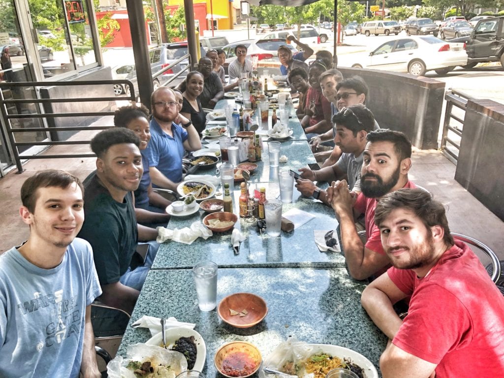 BlueFletch employees eating out during a team lunch