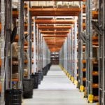 Looking down an aisle in a warehouse